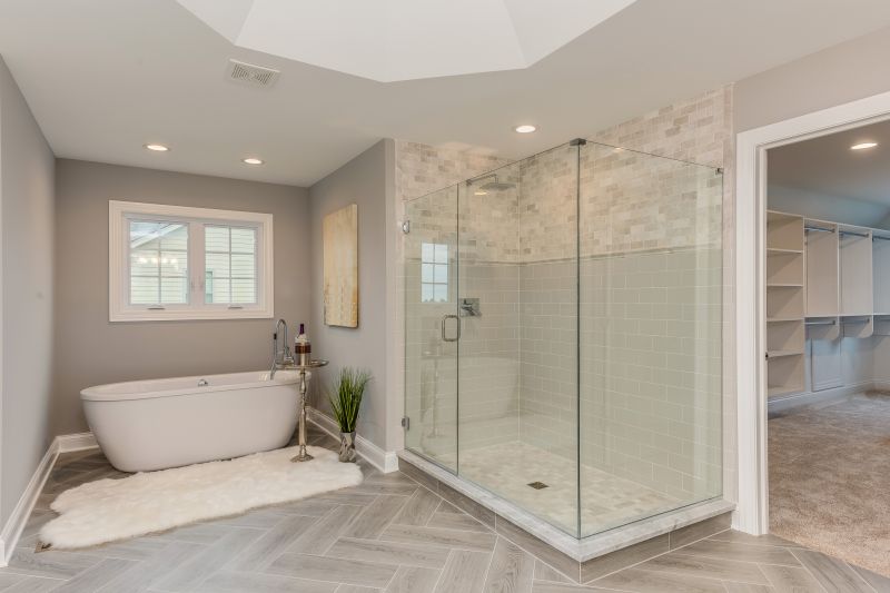 Bathroom renovation featuring a walk-in shower and modern fixtures