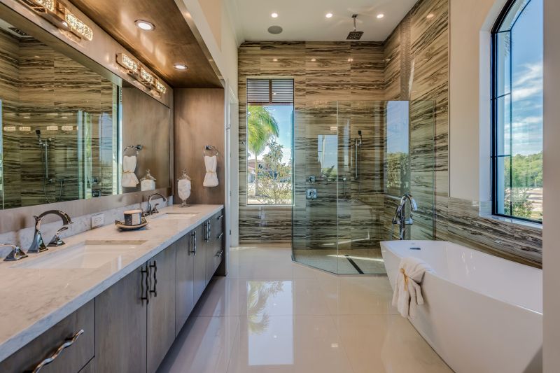 Elegant bathroom renovation with natural stone finishes